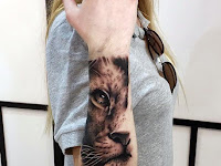 Half Lion Face Tattoo Design