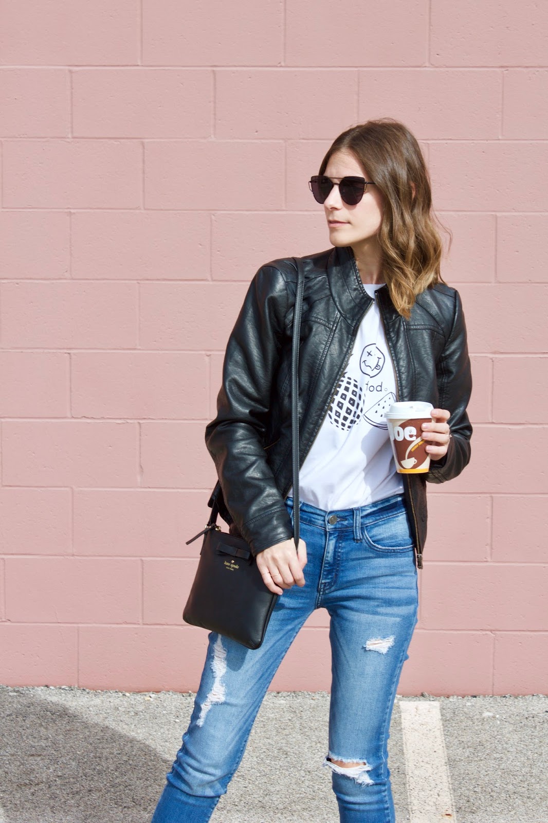 Black leather jacket and purse Black leather jacket and purse