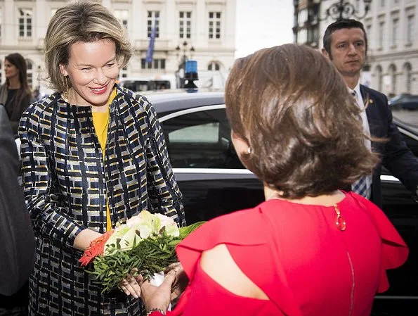 Queen Mathilde wore Natan Coat and Tikli Jewelry gold earrings, new campaign 'Schat Je Schatje of Child Focus