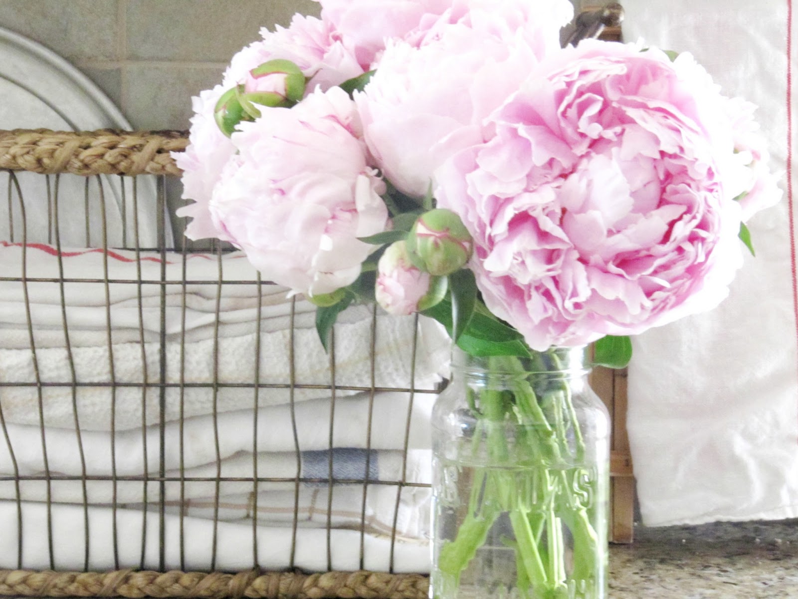 Peonies and a Basket full of towels