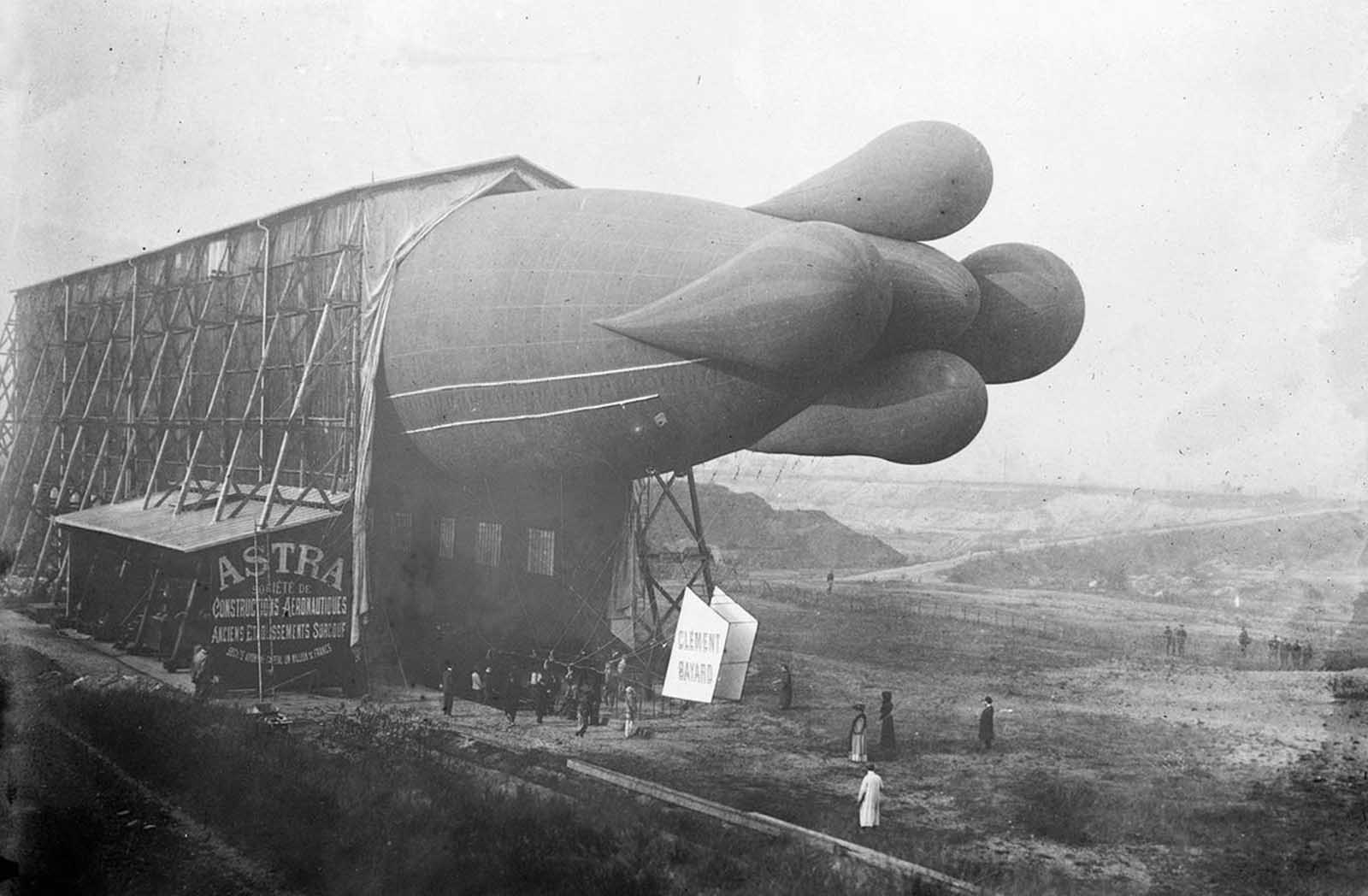 A Clement-Bayard dirigible in shed, France, ca 1908. The lobes on the tail, meant for stability, were removed form later models, as they were found to slow the craft in the air.