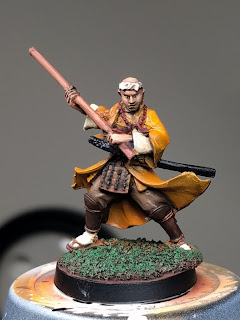Although the grass looks terrible (poor basing on my part) the orange and green contrast very well Finished Warrior Monk - front
