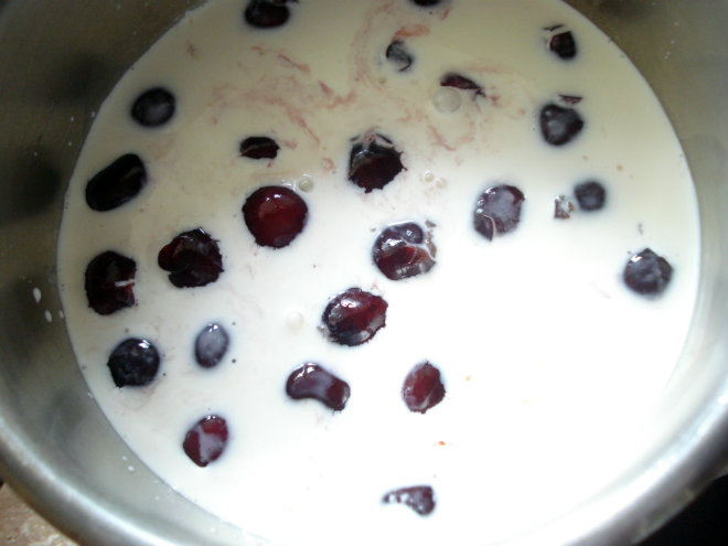 Cherry ice cream by Laka kuharica: put cherries, milk, and salt into a saucepan.