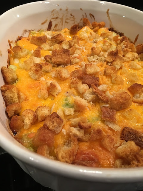 Hot Chicken Salad is a great way to feed a crowd, or serve as an appetizer! This dish is hot and cheesy chicken, and you get a crunch from the celery and croutons! 