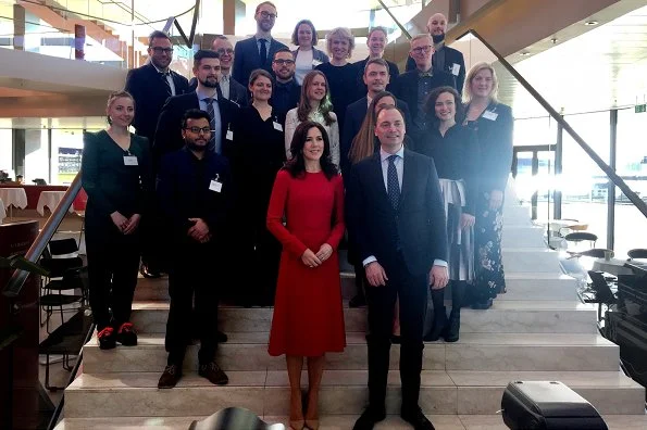 Crown Princess Mary wore a red midi dress by Dolce and Gabbana. Crown Princess Mary Dolce & Gabbana red contrast-stitch cady dress