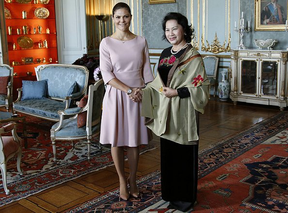 The fold London Camelot dress. Crown Princess Victoria of Sweden met with the Chairwoman of Vietnam's National Assembly Nguyen Thi Kim Ngan at the Royal Palace.