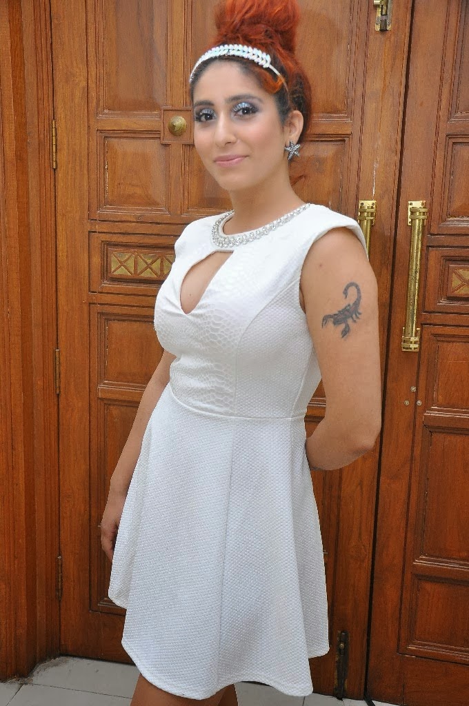Singer Neha Basin Latest White Dress Hot Cut Gallery