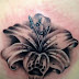 Tattoo de Flor nas costas