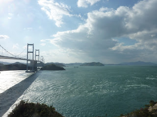 The Kurushima-Kaikyo bridge stretching into the distance as seen Oshima island on the Shimanami Kaido bikeway.