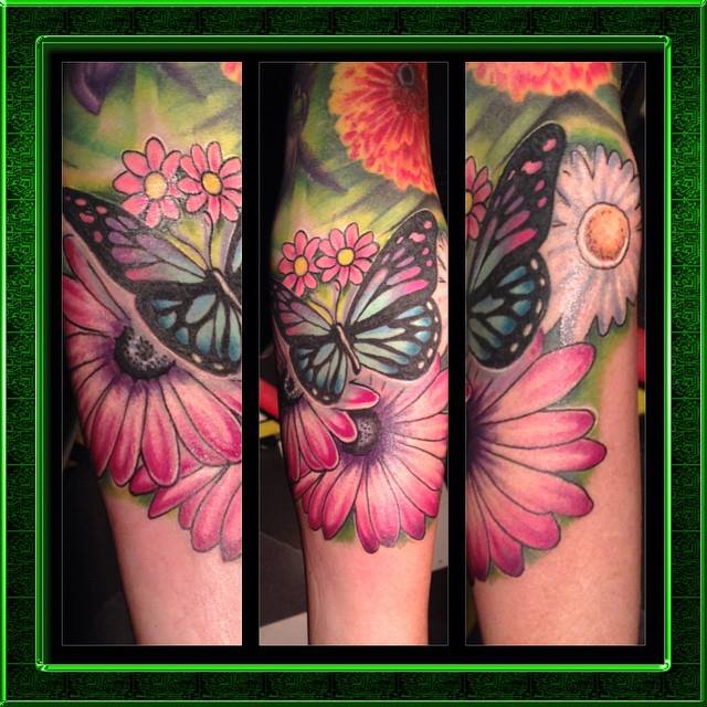 flowers and butterfly tattoo