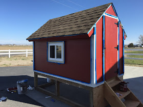 Painting the barn chicken coop