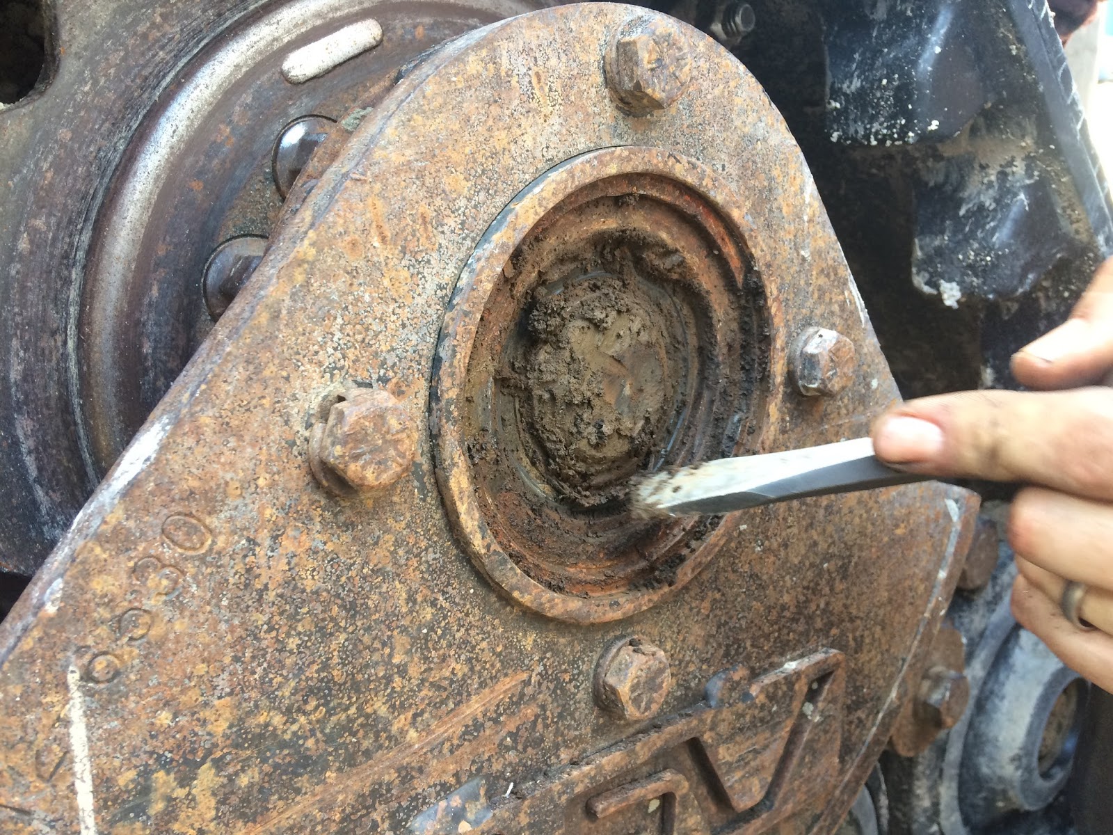 Another angle of the mud, this time on the right hand side track drive motor .