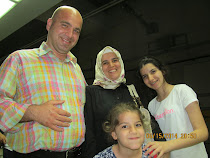 The family of Hamza Kaya in Istanbul: Hamza, Nagehan, Serra, and Berra (below) -- Turkey