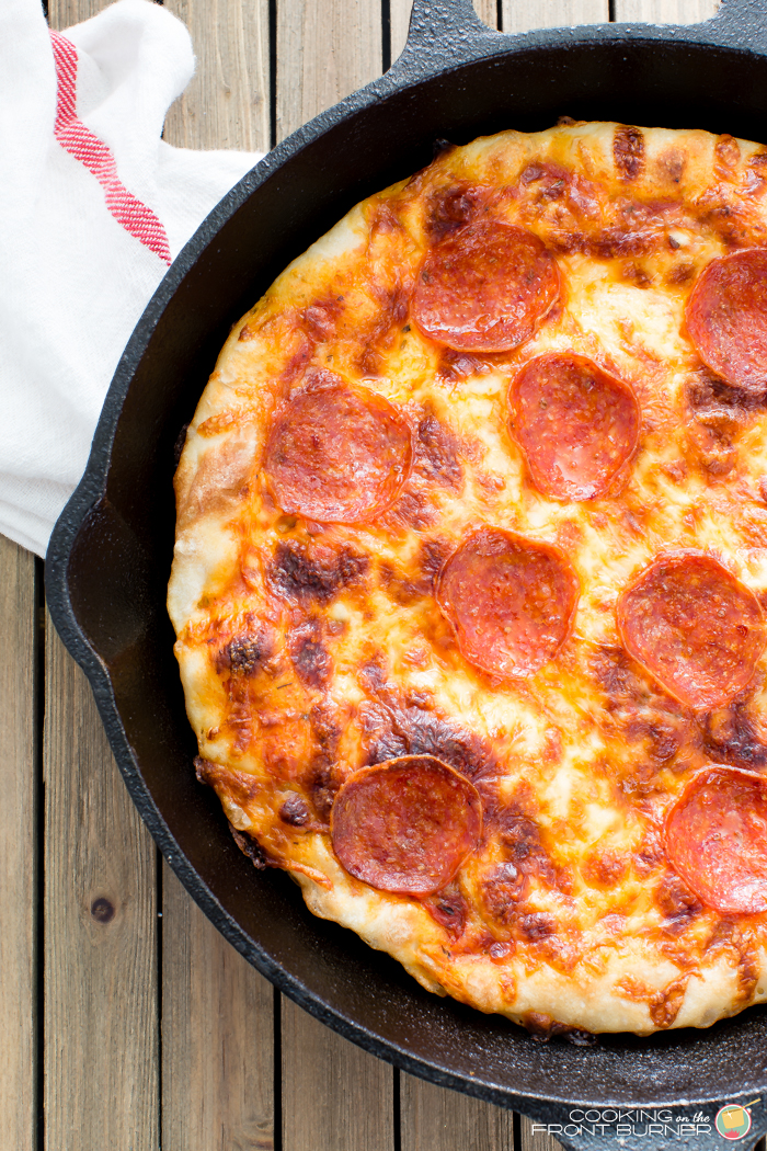 Cast Iron Skillet Pizza Cooking on the Front Burner