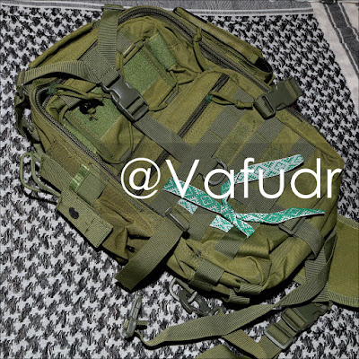 Adjustable Tactical Radio Pouch in Army Green color on Tactical Assault Military Sling 20L Backpack of green color