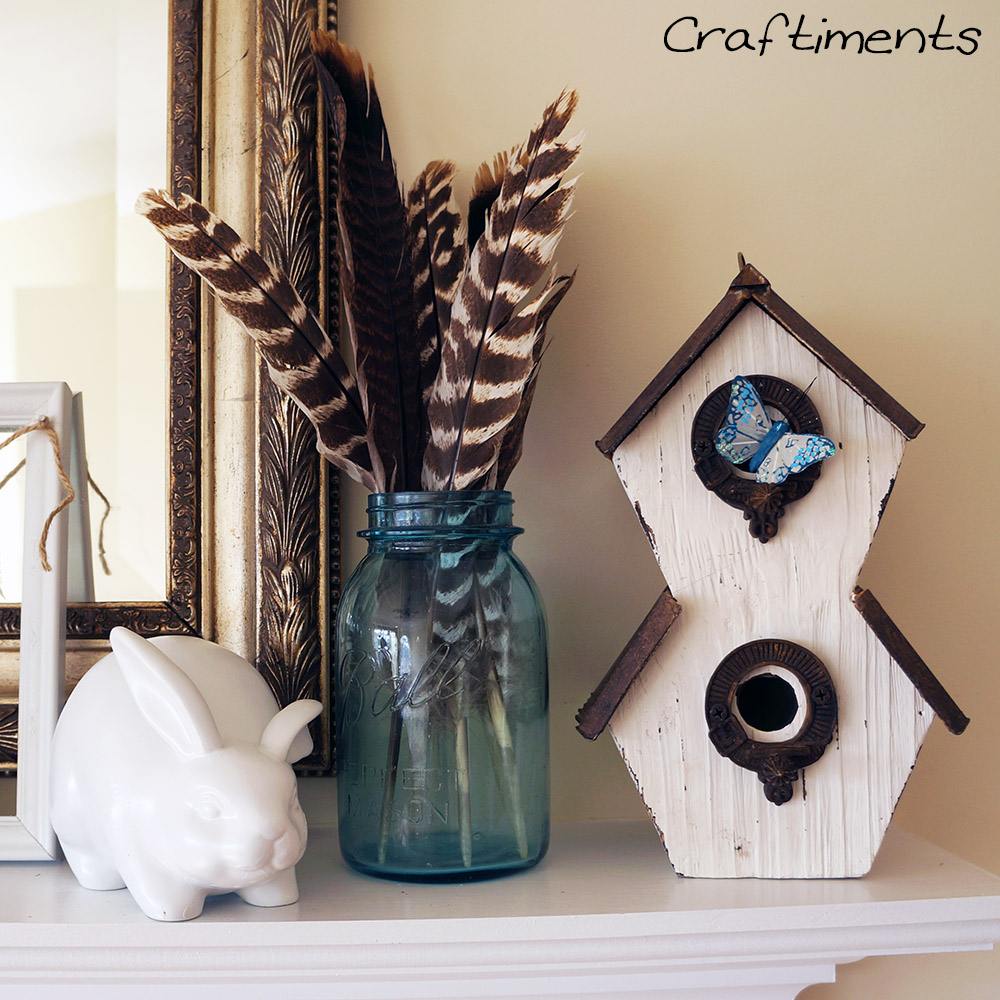 Craftiments:  Thrifted ceramic rabbit painted white, vintage mason jar of turkey feathers, and a birdhouse