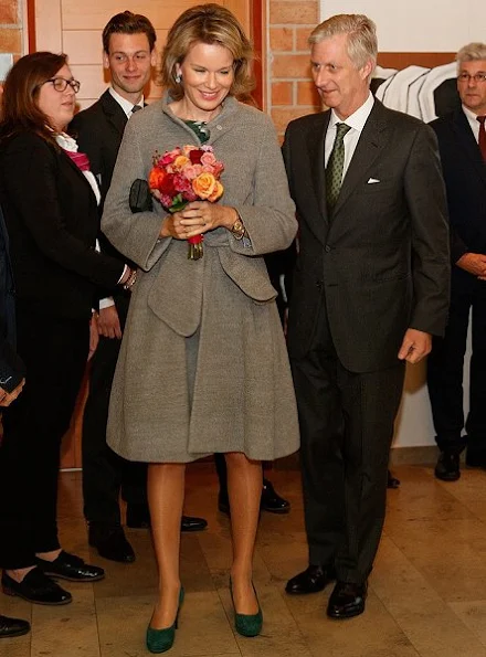 Queen Mathilde wore Natan dress, Natan coat, Natan shoes, Tikli Jewelry earrings, Delphine Nardin Gold Diamond Earrings, Diane von Furstenberg clutch