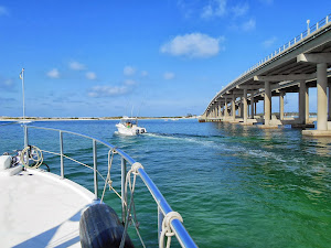Destin Inlet bridge. Fishing boat is heading into the Gulf. We turn right to the Gulf Waterway.