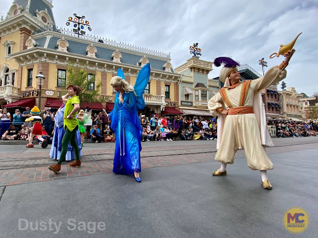 Genie, Aladdin, Tinker Bell, Peter Pan, Blue Fairy, Pinocchio, Fairy Godmother, Cinderella, The Sword in the Stone, The Princess and the Frog, Sleeping Beauty Magic Happens Float 