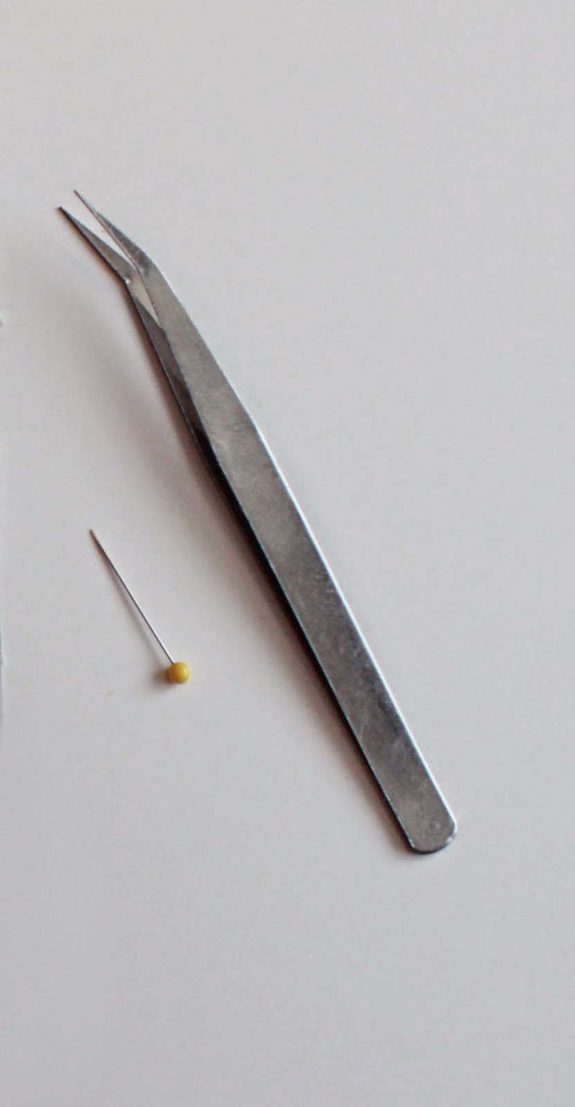 bent tip tweezers for curved piecing