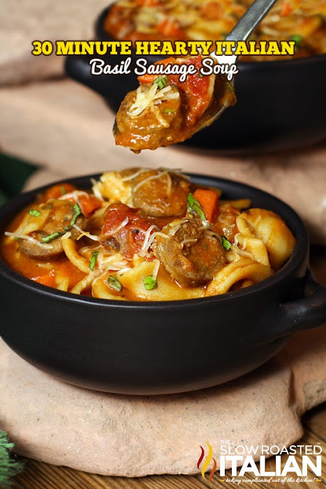 30 Minute Hearty Italian Basil Sausage Soup is loaded with basil, sausage and a few more ingredients to make this stick to your ribs soup! A simple recipe packed with Italian sausage, pasta, tomatoes, white beans and fresh basil it is straight out of your dreams with Italian flavors bursting in your mouth. @SlowRoasted