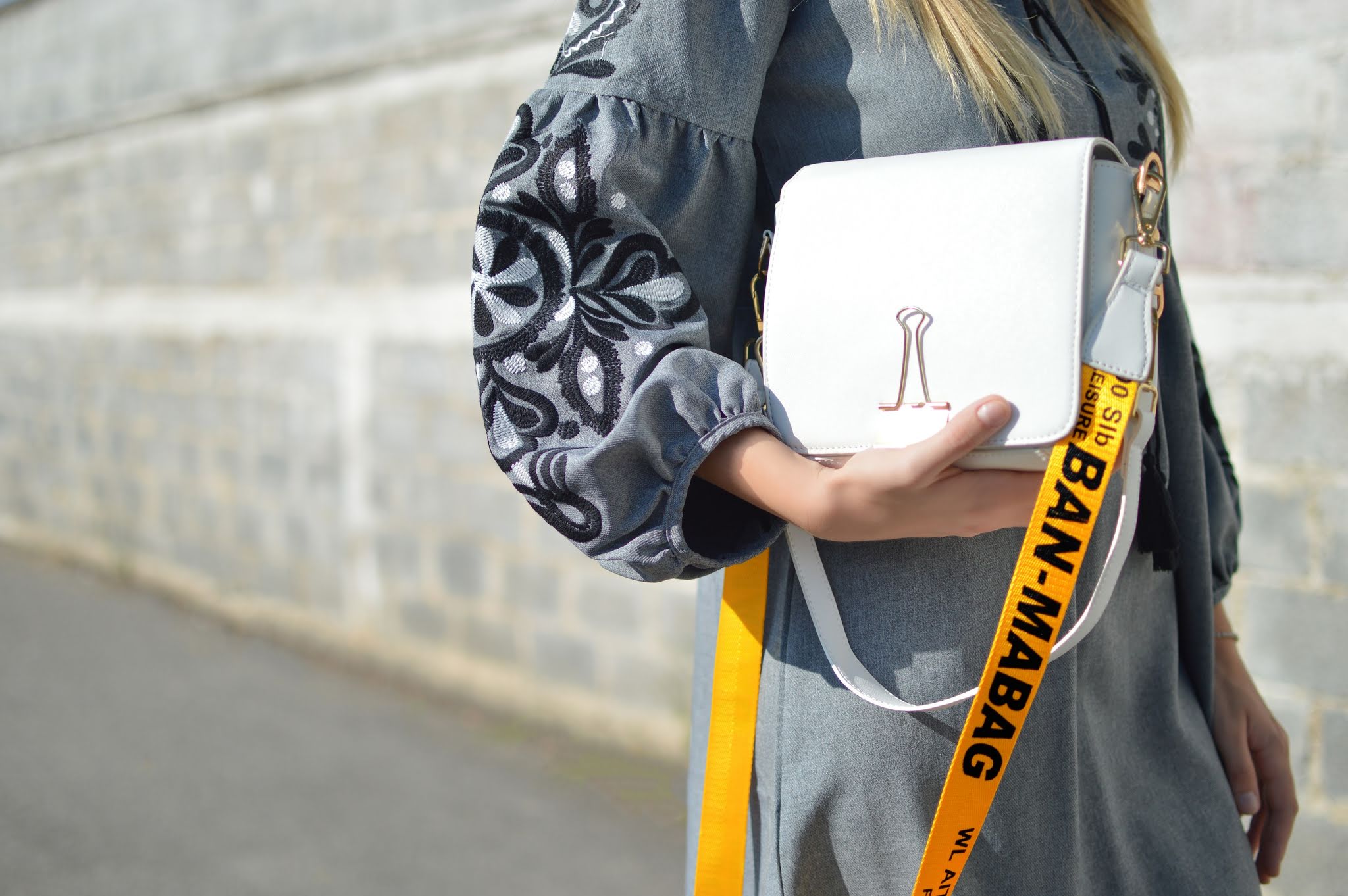 woman with a nylon strap handbag