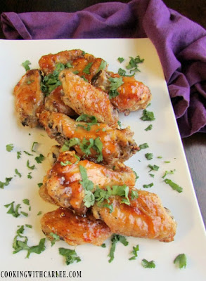 A little sweet and a little heat will have you licking your fingers and coming back for more! Peach habanero chicken wings are perfect game day food. platter of chicken wings glazed in peach habanero sauce