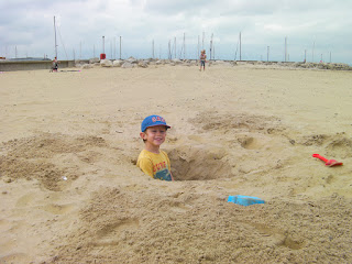 deep hole excavation on a sandy beach