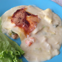  Lasanha de pescada e camarão com alho francês