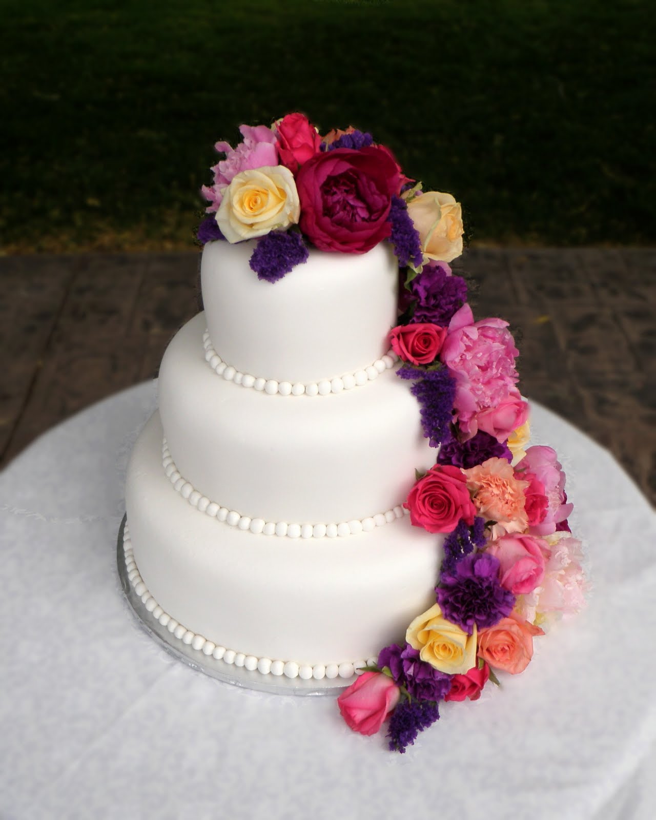 Layers of Love Draped Floral Wedding cake