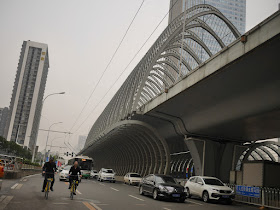 Zhongbei Road, including an elevated section with many arches over it, in Wuhan