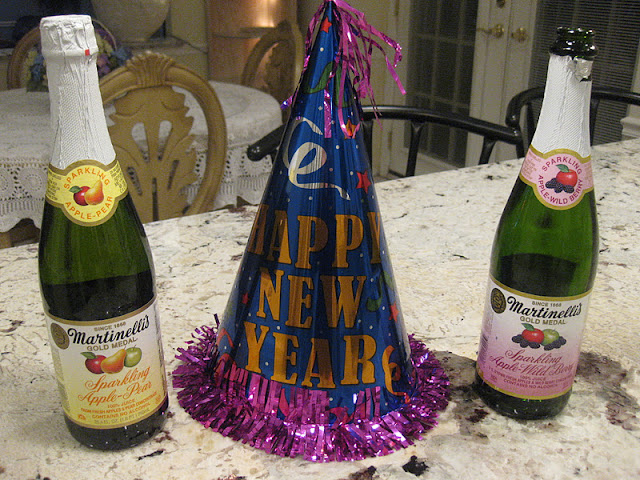 bottles of martenelli apple cider and happy new year