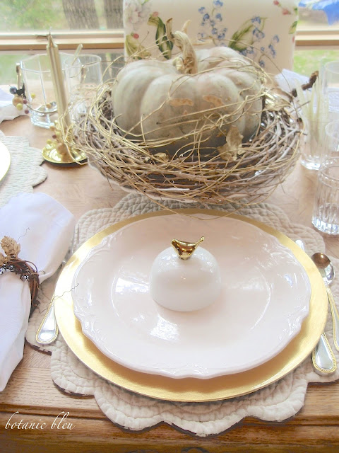 Thanksgiving gold and white table setting with gold bird butter holders