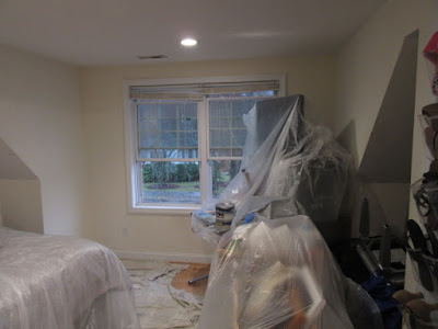 before image of bedroom being prepped before painting.