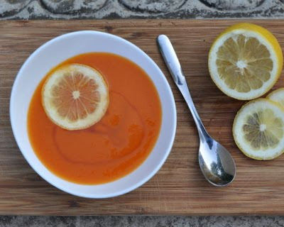 Chilled Carrot Soup with Honey, bright with spices and small kick of cayenne, sweetened w a drizzle of honey.