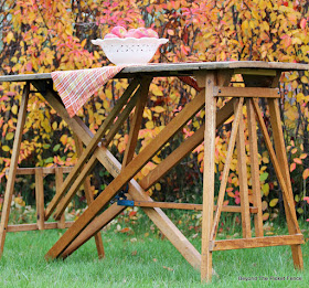 repurpose ironing board bases into a table 