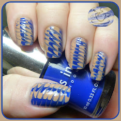 nail toothpick marble navy capris camel blouse wearing today