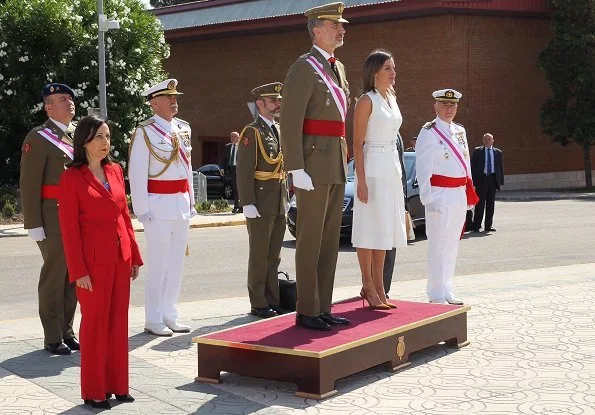 Queen Letizia of Spain wore Felipe Varela dress and Carolina Herrera suede pumps, carried Carolina Herrera bag from Camelot collection