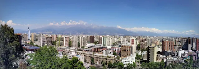 Why visit Santiago: Panoramic view of the Santiago skyline and mountains from Santa Lucia Hill