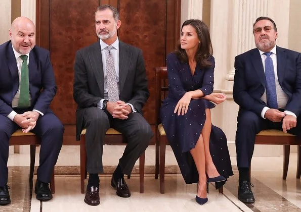 Queen Letizia wore a new asymmetric midi dress by Maje. We saw the same dress on Argentina's First Lady Juliana Awada