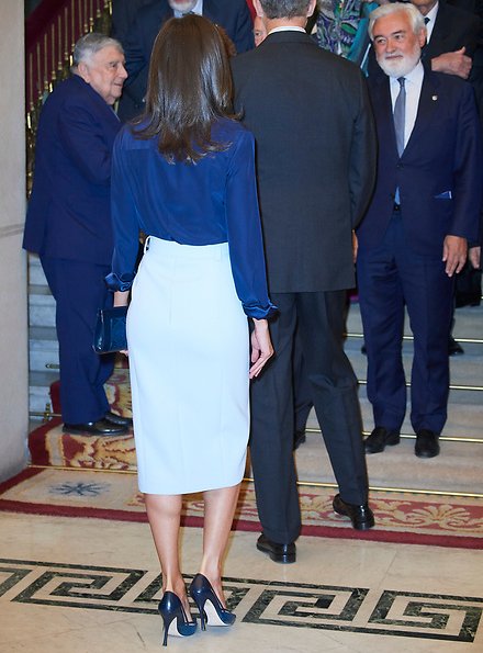 Queen Letizia wore Hugo Boss high waisted pencil skirt same worn Crown Princess Mary,, and Carolina Herrera navy shirt, and Magrit pumps