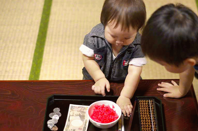 child,1st birthday,tray,abacus,money,food