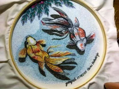yellow-red-and-white-orange-goldfish embroidered by Java Harmony