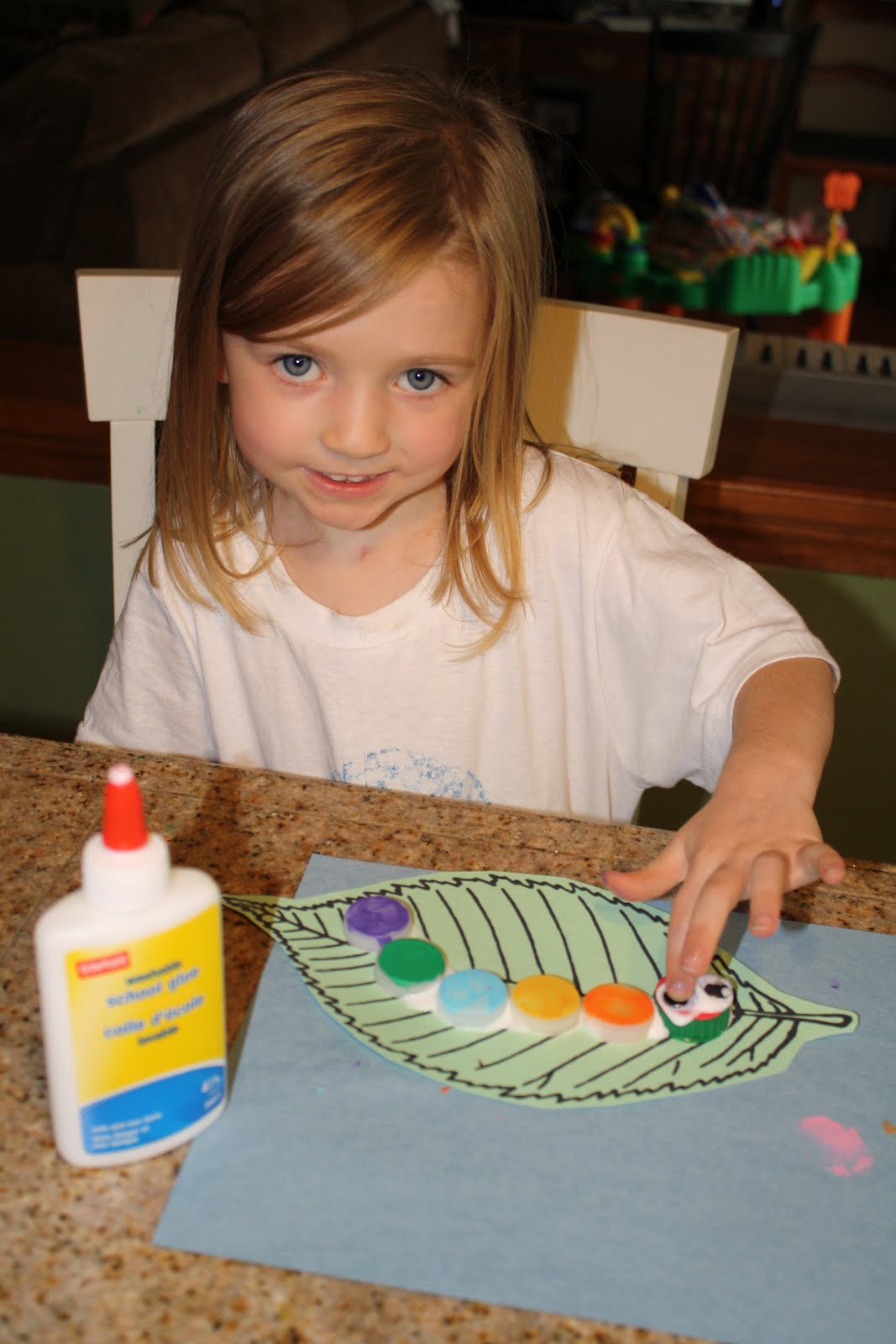 The Laber Family C is for Caterpillar Caterpillar Bottle Cap Craft by Maya