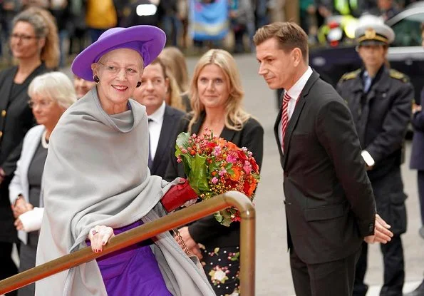 Queen Margrethe, Crown Prince Frederik and Princess Benedikte. Crown Princess Mary wore Claes Iversen coat