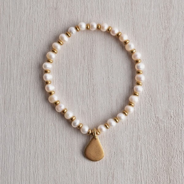 http://www.whitetrufflestudio.com/collections/bracelets/products/white-truffle-gilded-drop-pearl-bracelet
