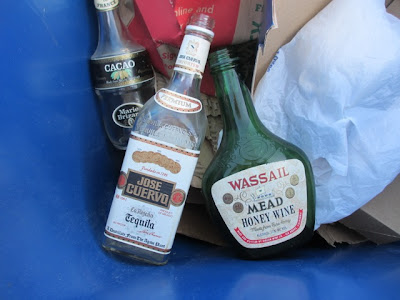 liquor bottles in recycling bin