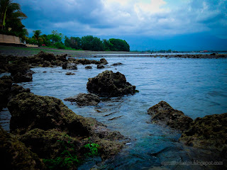 Cloudy Atmosphere On The Rocky Fishing Beach At Umeanyar Village, North Bali, Indonesia