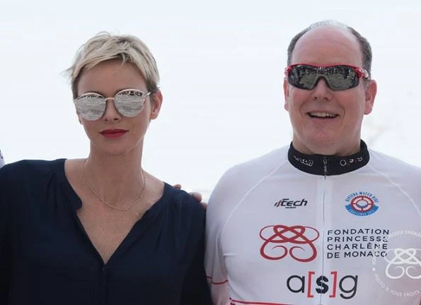 Prince Albert and Princess Charlene attended Riviera Water Bike Challenge at Monaco Yacht Club. Princess Charlene a injury in her wrist.