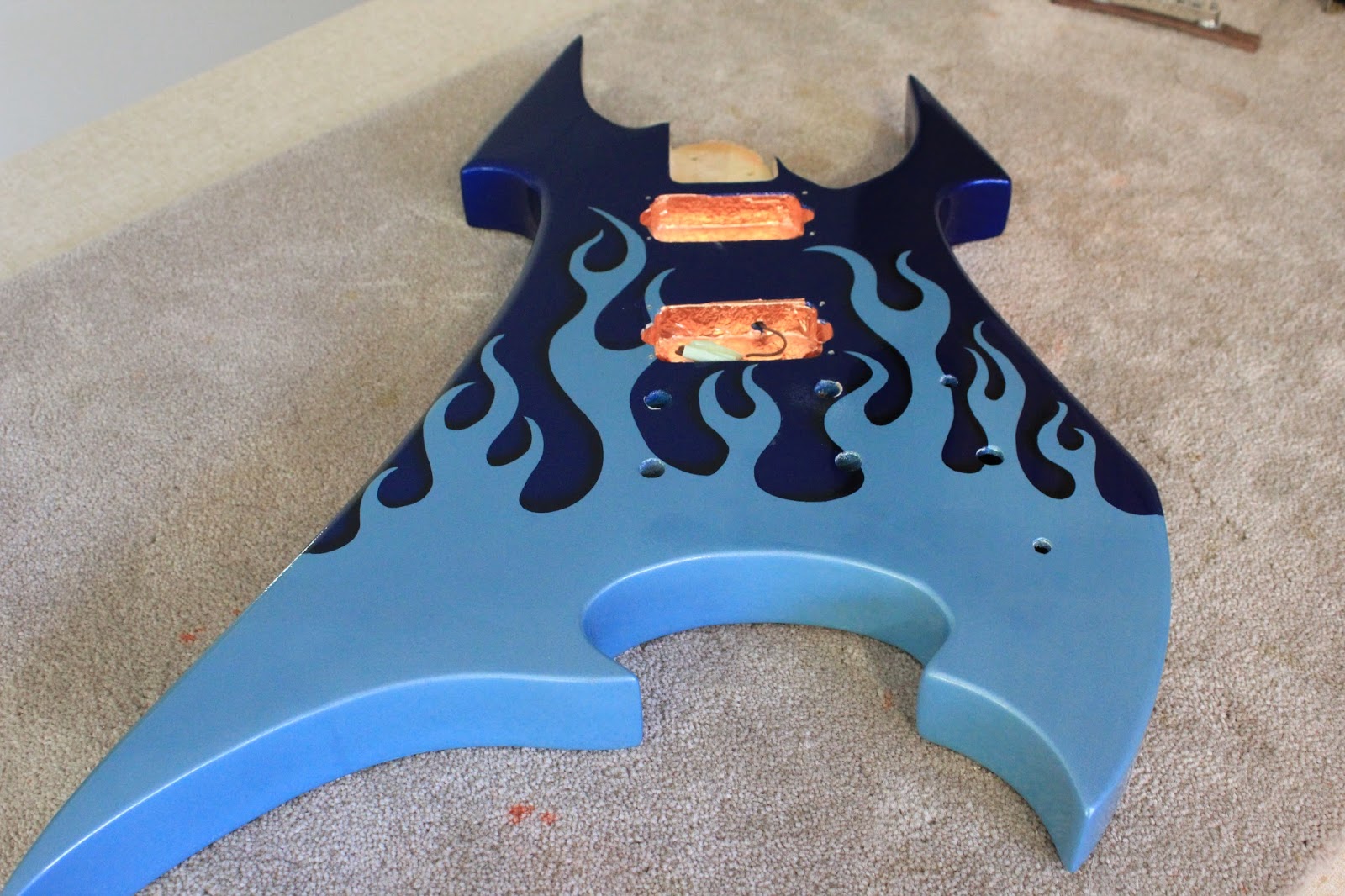 After shielding, we grounded the bridge and installed the pickups with  their chrome surrounds. The pickups are the Entwistle HVX which I have read  rave ...